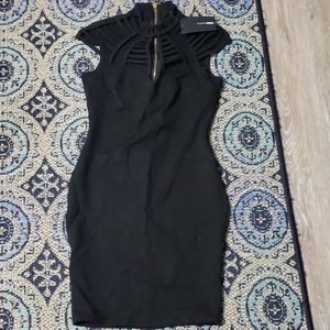 Black bodycon dress with chest detail